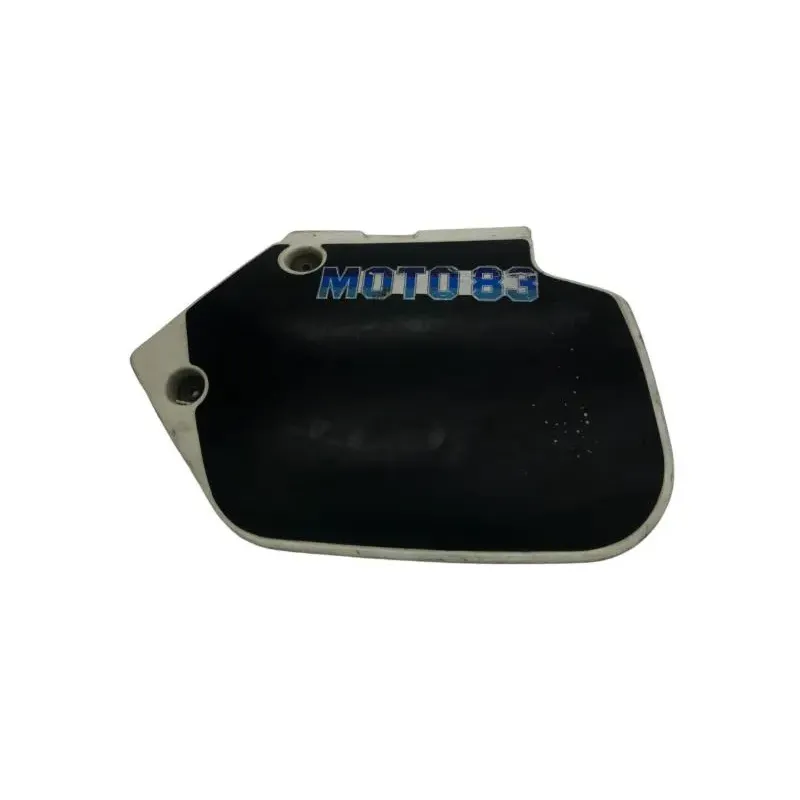 Cache carenage sous selle gauche SUZUKI TS 125 X 1984-1986