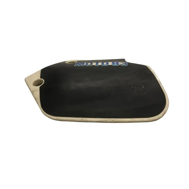Cache carenage sous selle gauche SUZUKI TS 125 X 1984-1986