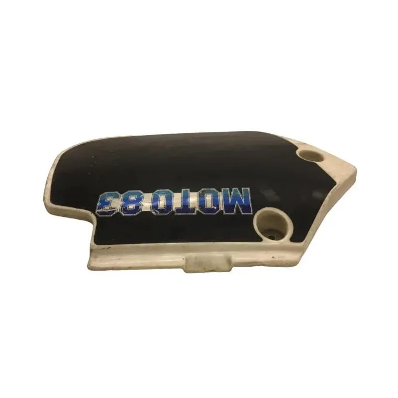 Cache carenage sous selle gauche SUZUKI TS 125 X 1984-1986