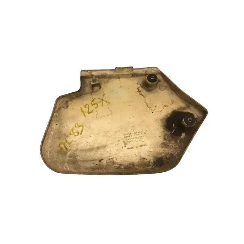 Cache carenage sous selle gauche SUZUKI TS 125 X 1984-1986