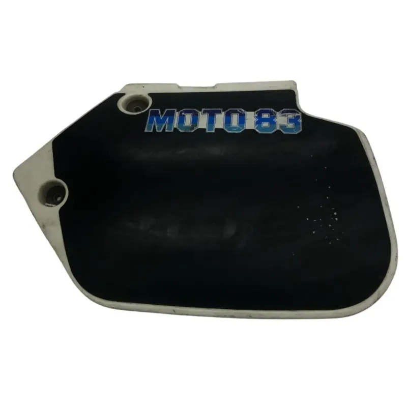 Cache carenage sous selle gauche SUZUKI TS 125 X 1984-1986