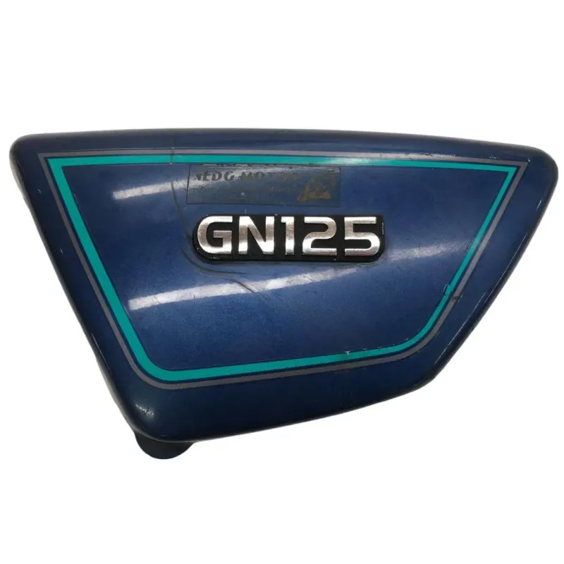Cache carenage sous selle gauche SUZUKI GN 125 1982-1996