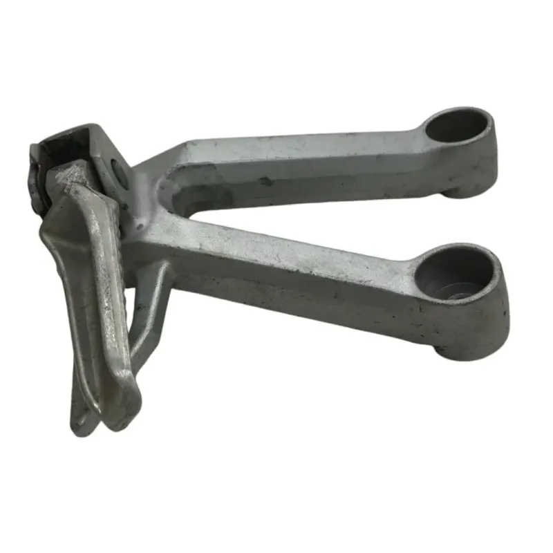 Platine et repose pieds arriere gauche SUZUKI SV 650 S 2003-2006