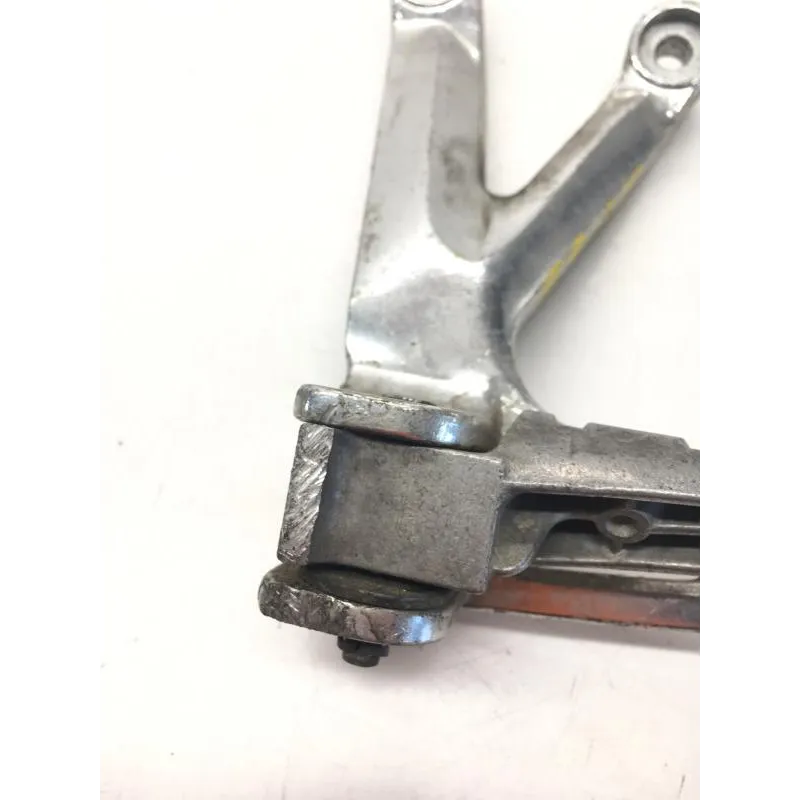 Platine et repose pieds arriere gauche YAMAHA TZR 50 1997-2002