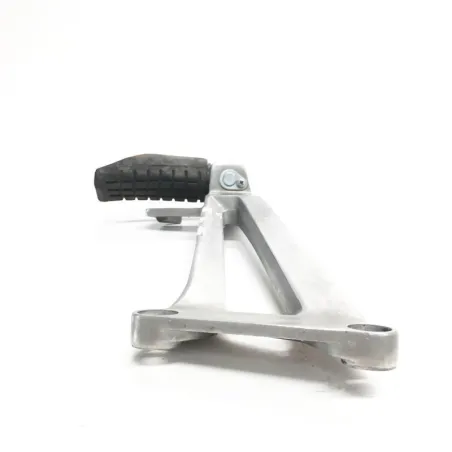 Platine et repose pieds arriere gauche HONDA CBR 125 R 2004-2006