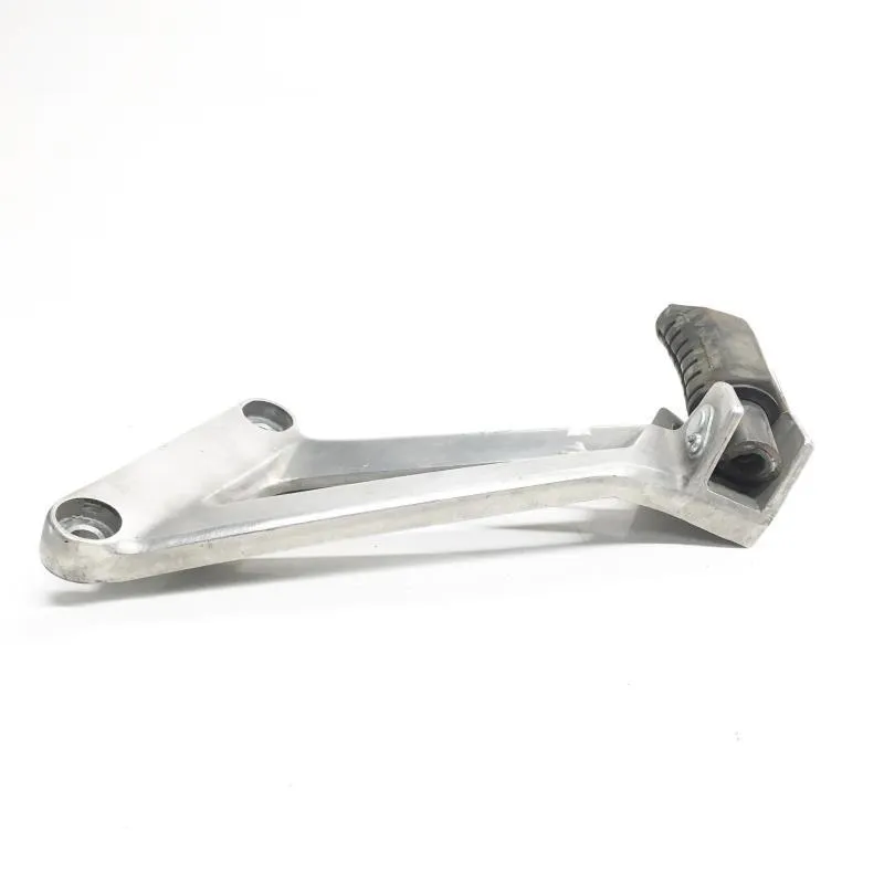 Platine et repose pieds arriere gauche HONDA CBR 125 R 2004-2006