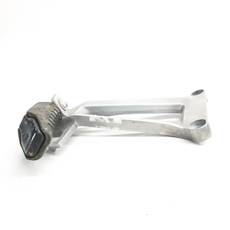 Platine et repose pieds arriere gauche HONDA CBR 125 R 2004-2006