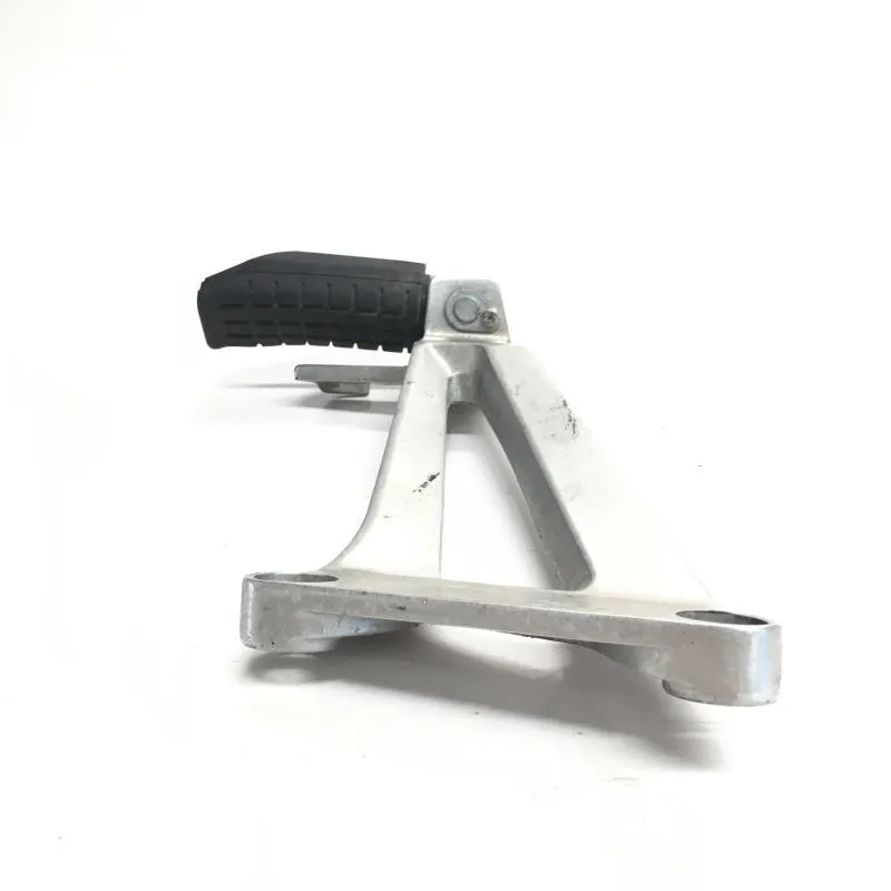 Platine et repose pieds arriere gauche HONDA CBR 125 R 2004-2006