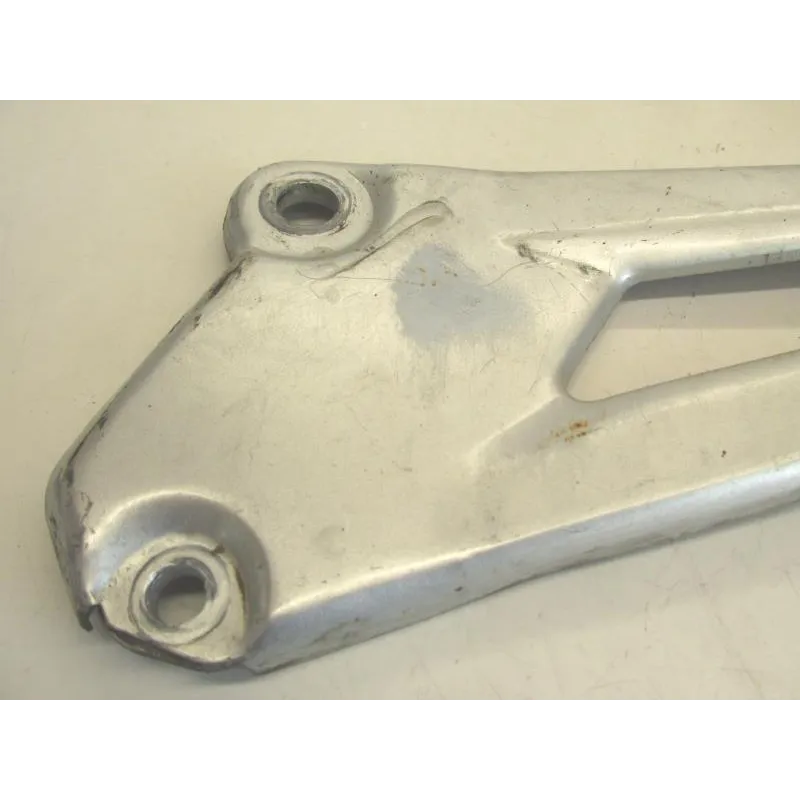 Platine et repose pieds arriere gauche YAMAHA YBR 125 2005-2006